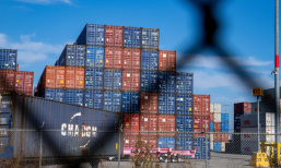 trade war, fence and shipping containers